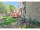 Spacious backyard featuring patio seating, lush landscaping, and easy access to the deck at 1187 Newbridge Ne Trce, Atlanta, GA 30319