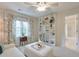 Bright bedroom features a ceiling fan, built-in shelves, and ensuite bathroom at 1187 Newbridge Ne Trce, Atlanta, GA 30319