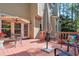 Backyard deck with multiple seating areas and shaded umbrellas, perfect for entertaining at 1187 Newbridge Ne Trce, Atlanta, GA 30319