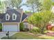 Charming home with a two-car garage and well-manicured lawn at 1187 Newbridge Ne Trce, Atlanta, GA 30319