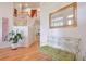 Bright foyer with hardwood floors, staircase, and stylish decor at 1187 Newbridge Ne Trce, Atlanta, GA 30319