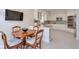 Open kitchen and dining area with stainless steel appliances and ample counter space at 1187 Newbridge Ne Trce, Atlanta, GA 30319