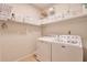 Functional laundry room featuring modern appliances and plenty of storage space at 1187 Newbridge Ne Trce, Atlanta, GA 30319