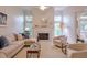Inviting living room featuring a fireplace, neutral tones, and ample seating at 1187 Newbridge Ne Trce, Atlanta, GA 30319