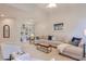 Spacious living room with built-in shelving, comfortable seating, and natural light at 1187 Newbridge Ne Trce, Atlanta, GA 30319