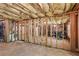 Spacious unfinished basement shows framing, insulation, and lots of potential for future development at 155 Palmer Oaks Ln, Marietta, GA 30068