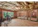 Unfinished basement shows framing, insulation, and a large window with a nice outdoor view at 155 Palmer Oaks Ln, Marietta, GA 30068