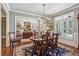 Classic dining room featuring a wooden table, shuttered windows, and decorative accents at 155 Palmer Oaks Ln, Marietta, GA 30068