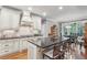 Bright kitchen with white cabinets, granite countertops, and stainless steel appliances at 155 Palmer Oaks Ln, Marietta, GA 30068