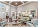 Bright living room with hardwood floors, high ceilings, comfortable seating, and an open view to the kitchen at 155 Palmer Oaks Ln, Marietta, GA 30068
