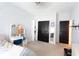 Comfortable bedroom featuring a vanity, large closet, and neutral color palette at 309 Daffodil Dr, Temple, GA 30179