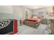 Bright bedroom with a bed, ceiling fan, dresser and large windows for natural light at 3105 Colonial Way # F, Atlanta, GA 30341