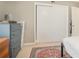 Bedroom view with a red rug and closet at 3105 Colonial Way # F, Atlanta, GA 30341