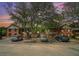 Apartment building with brick facade, mature trees and ample parking in front at 3105 Colonial Way # F, Atlanta, GA 30341