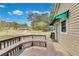 Deck with built-in bench seating, offering views of the yard and surrounding neighborhood at 150 Burke St Ne, Marietta, GA 30060