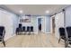 Bright living room featuring new hardwood floors and a modern sliding barn door for easy access at 150 Burke St Ne, Marietta, GA 30060