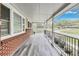 Spacious porch with room for seating, offering a serene view of the neighborhood and greenery at 150 Burke St Ne, Marietta, GA 30060