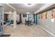 Basement features an open floor plan, ample seating, and walls filled with artwork at 196 Wadley Nw St, Atlanta, GA 30314