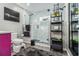Modern bathroom with walk-in shower, dual vanity with bright-colored cabinets and a stylish mirror at 196 Wadley Nw St, Atlanta, GA 30314