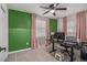 Bedroom area features plush carpet, a ceiling fan, and an abundance of natural light at 196 Wadley Nw St, Atlanta, GA 30314