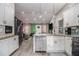 Well-lit kitchen featuring stainless steel appliances and views to the living room at 196 Wadley Nw St, Atlanta, GA 30314