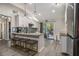 Modern kitchen features stainless appliances, granite counters, and a breakfast bar with seating for four at 196 Wadley Nw St, Atlanta, GA 30314