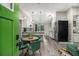 Well-lit living area featuring modern decor, an open kitchen, and sleek appliances at 196 Wadley Nw St, Atlanta, GA 30314