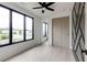 Bright bedroom with large windows, ceiling fan and closet at 1968 8Th St, Chamblee, GA 30341