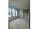 Bedroom with large windows, a closet, and hardwood floors ready for finishing at 1968 8Th St, Chamblee, GA 30341