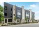 Contemporary townhome showcasing a modern facade, manicured landscaping and curb appeal at 1968 8Th St, Chamblee, GA 30341