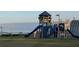 Community playground featuring multiple slides, climbing equipment, and swings at 1968 8Th St, Chamblee, GA 30341