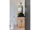 Stylish powder room with modern fixtures, a floating vanity, and elegant marble backsplash at 1968 8Th St, Chamblee, GA 30341