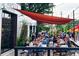 Outdoor patio with casual dining at a local restaurant at 1968 8Th St, Chamblee, GA 30341