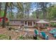 Spacious backyard featuring a patio, gazebo, and mature trees for outdoor enjoyment at 1998 Jordan Terrace Ne, Atlanta, GA 30345