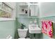 Cozy bathroom with vintage fixtures, and tiled walls, perfect for a refreshing space at 1998 Jordan Terrace Ne, Atlanta, GA 30345