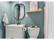 Well-lit bathroom featuring modern fixtures, a white vanity, and a toilet at 1998 Jordan Terrace Ne, Atlanta, GA 30345