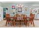 Elegant dining room featuring a wooden table set for eight and stylish decor at 1998 Jordan Terrace Ne, Atlanta, GA 30345