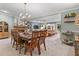 Open-concept dining and living space features a fireplace, bar, and comfortable furniture at 1998 Jordan Terrace Ne, Atlanta, GA 30345