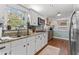 Cozy kitchen featuring stainless steel appliances, ample counter space, and natural light at 1998 Jordan Terrace Ne, Atlanta, GA 30345