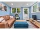 Basement living room with great natural light, comfortable seating, and stylish decor at 1998 Jordan Terrace Ne, Atlanta, GA 30345