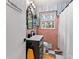 Charming powder room with unique decor, stylish fixtures, and modern accents at 1998 Jordan Terrace Ne, Atlanta, GA 30345