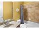 Clean bathroom with a tiled shower and a granite sink at 3597 Old Maple Rd, Johns Creek, GA 30022