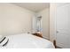 Light-filled bedroom featuring neutral colors and simple design at 3597 Old Maple Rd, Johns Creek, GA 30022
