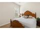 Cozy bedroom with wooden furniture and natural light at 3597 Old Maple Rd, Johns Creek, GA 30022
