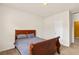 Inviting bedroom bathed in natural light, featuring a comfortable bed and easy access to other rooms at 3597 Old Maple Rd, Johns Creek, GA 30022