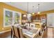 Eat-in kitchen area with a view of the stainless steel appliances and granite countertops at 3597 Old Maple Rd, Johns Creek, GA 30022