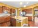 Bright kitchen with stainless steel appliances, granite countertops, and a large center island at 3597 Old Maple Rd, Johns Creek, GA 30022