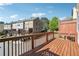 Spacious wood deck offers an outdoor living space with views of the townhome community at 4899 Seldon Se Way, Smyrna, GA 30080