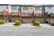 Townhome exteriors with private garages, decks, and well-maintained landscaping at 4899 Seldon Se Way, Smyrna, GA 30080