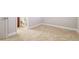 Bedroom with neutral carpet leading to an en suite bathroom with updated fixtures at 4899 Seldon Se Way, Smyrna, GA 30080
